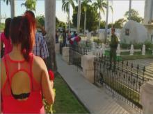 Visitors lay flowers at the tomb of late Cuban leader Fidel Castro