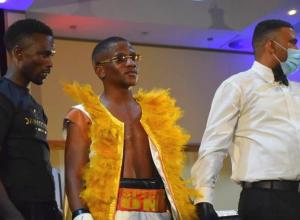 Nangolo retains featherweight title