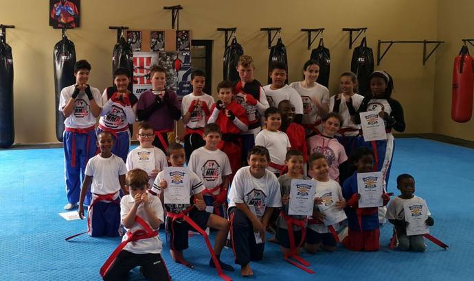 28 students grade in the 2016 MMA and Kickboxing Academy