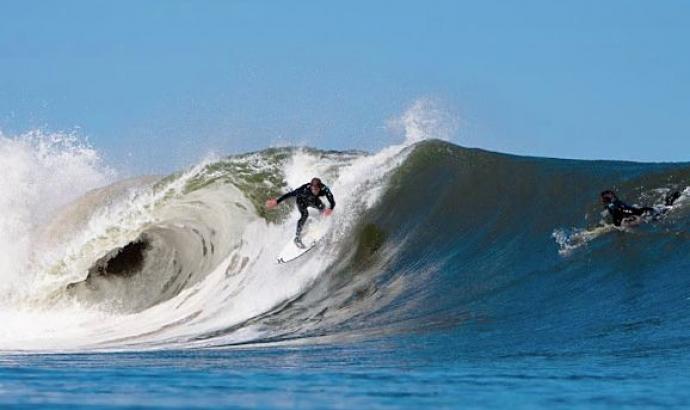 Surfers flock to Skeleton Bay for World best waves