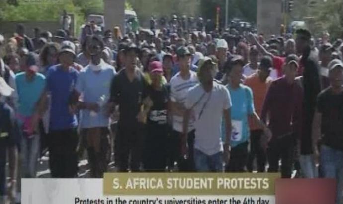 South African police and university students clash 